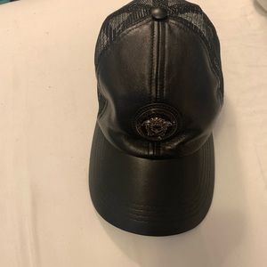 Versace leather hat.